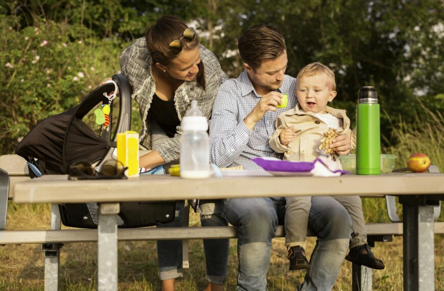 Family by picnic table
