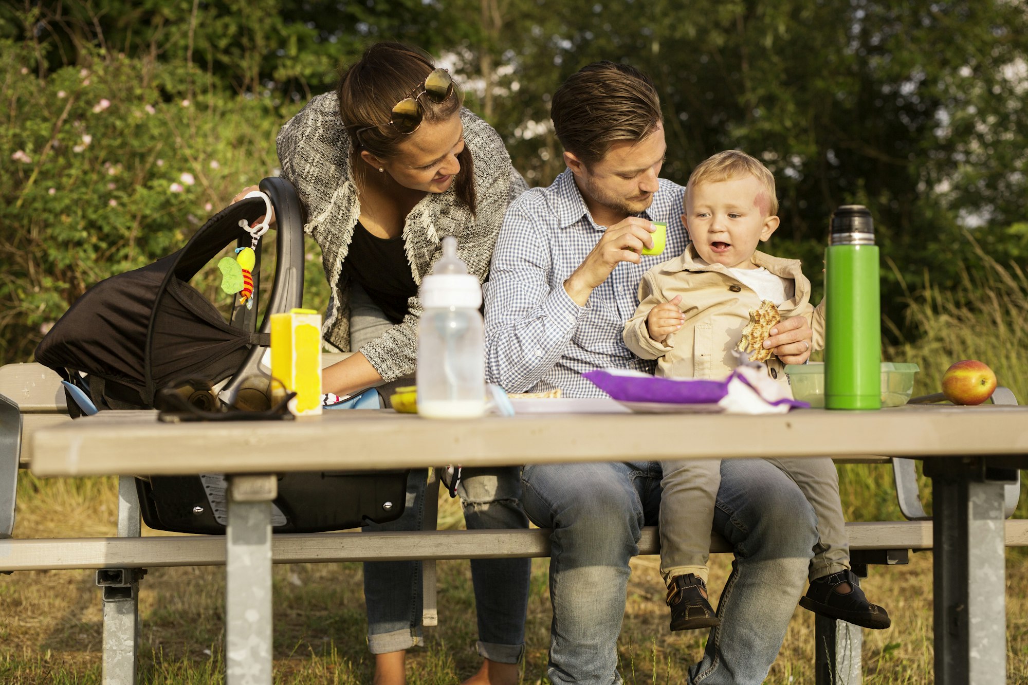 Family by picnic table