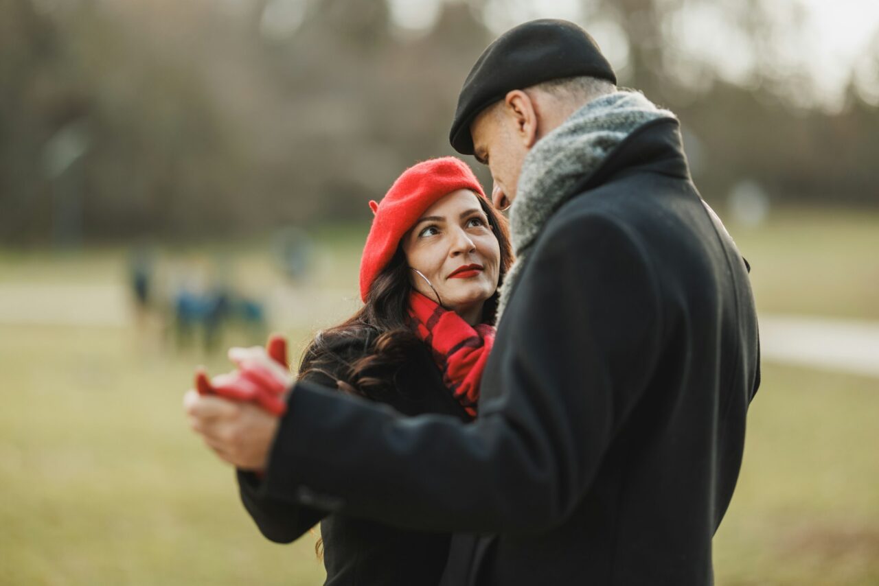 Man and Woman Dancing Outdoors