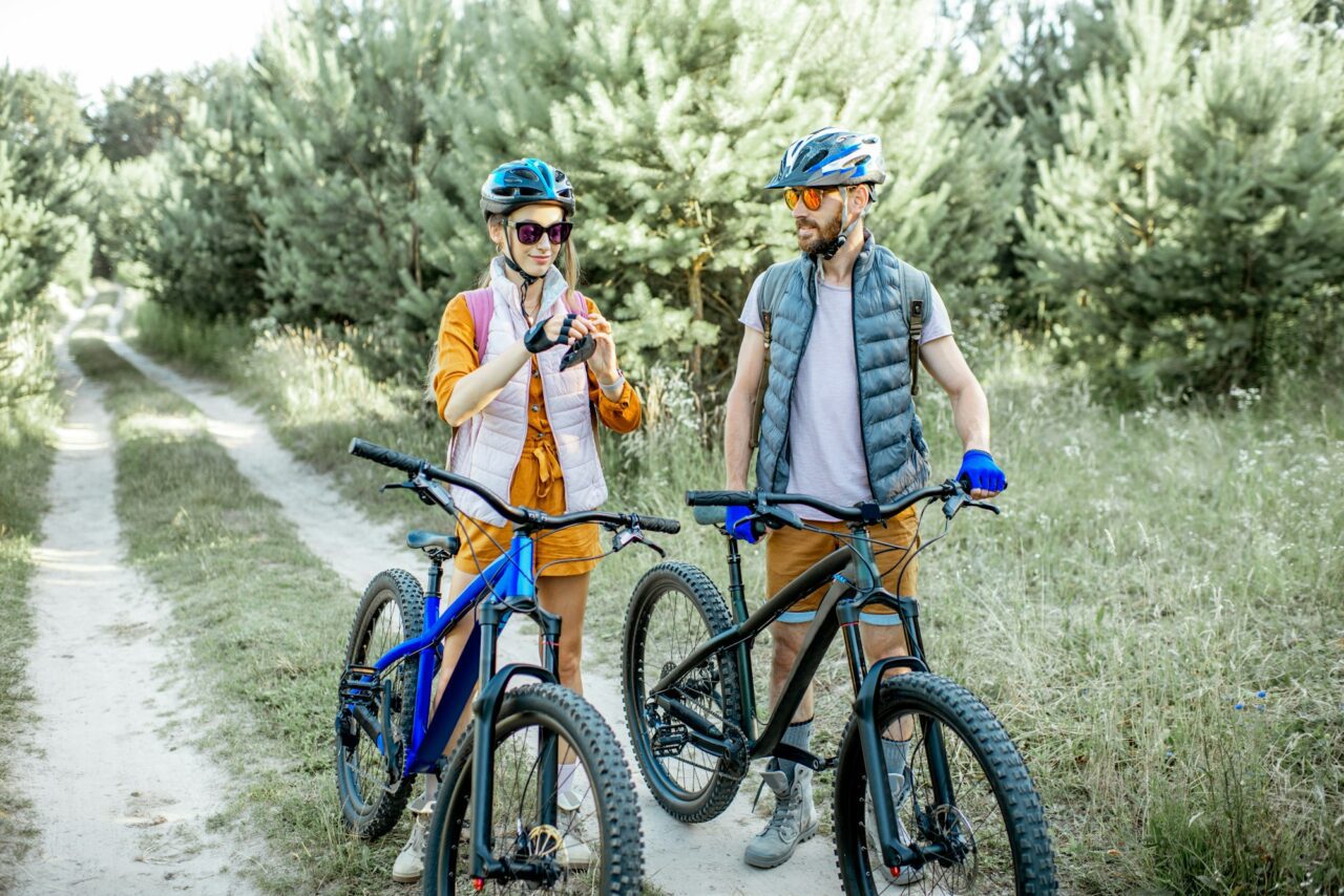 Young couple traveling with bicycles