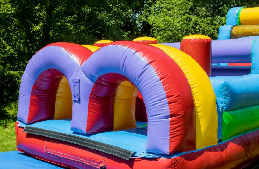 Funny off kids in the plays in an castle inflatable slides