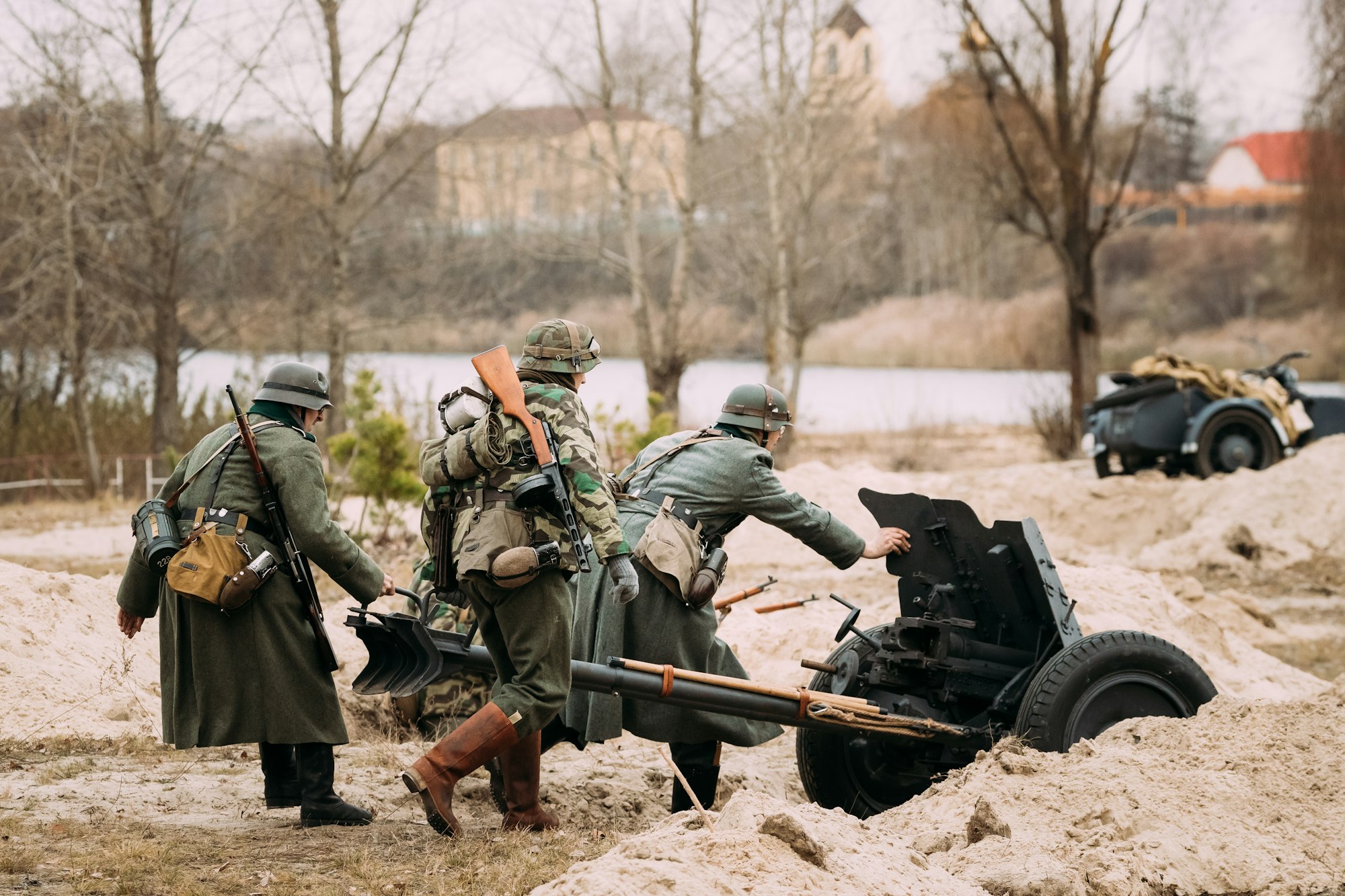 Re-enactors Dressed As German Wehrmacht Soldiers In WWII Roll Ou
