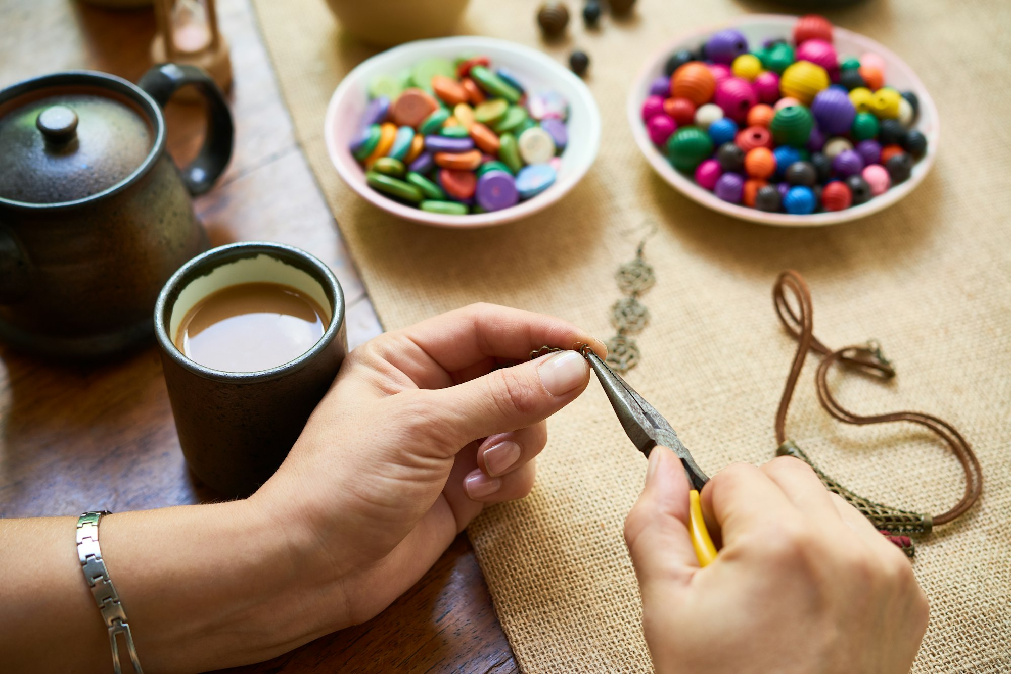 Woman making handmade accessories