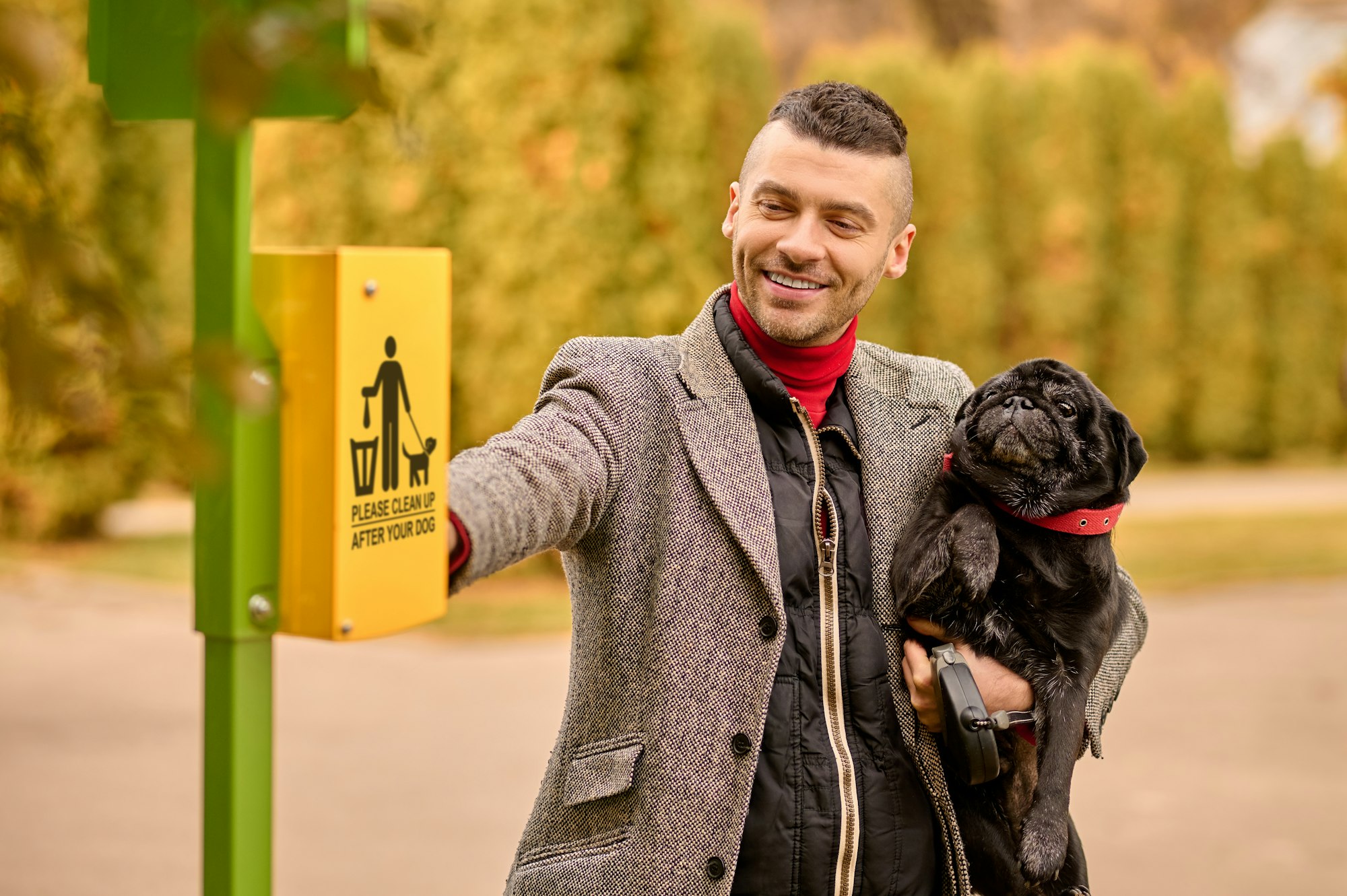 A pet owner taking cleaning stuff from the box