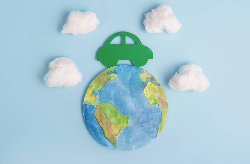 Green car and planet earth. Ecological transport. Ecology concept.