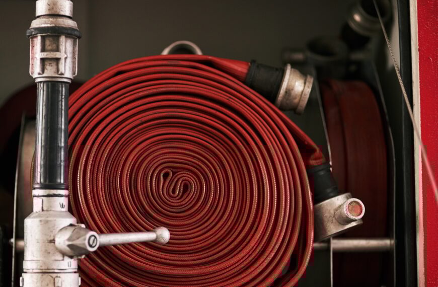 Behind the scenes at the fire station. Cropped shot of a coiled fire hose.