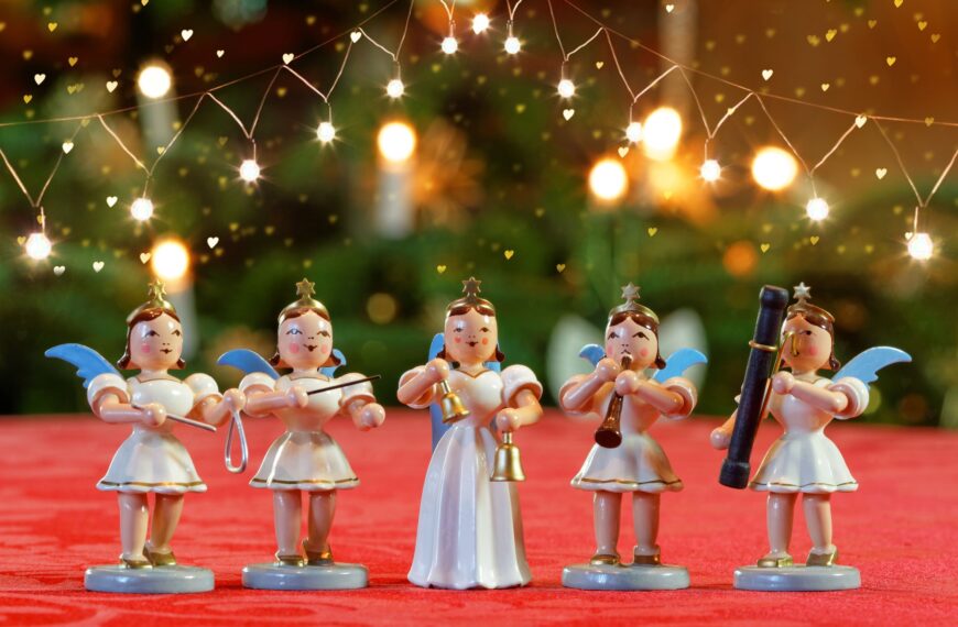 Closeup shot of a choir of toys of angels singing Christmas Carols