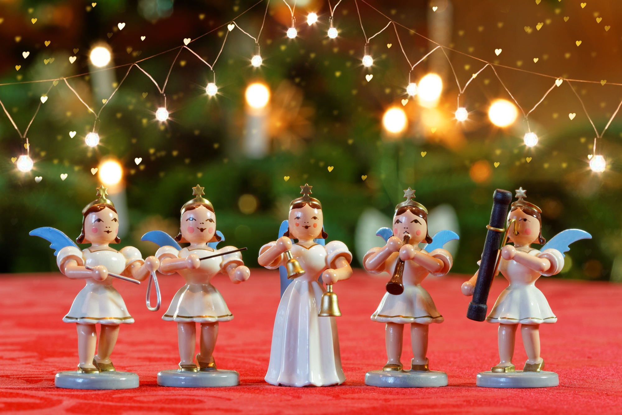 Closeup shot of a choir of toys of angels singing Christmas Carols