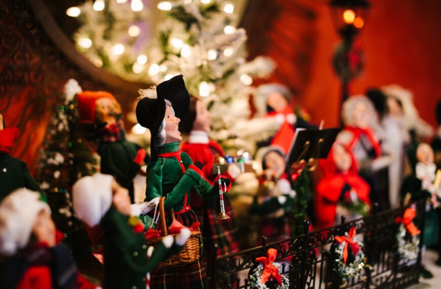 vintage Christmas caroler decorations neatly on display in a home